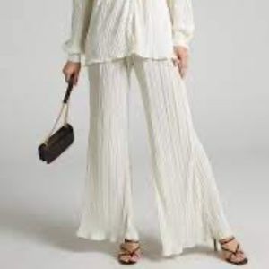 SHOW PO BECA PLISSE FLARED PANTS IN CREAM